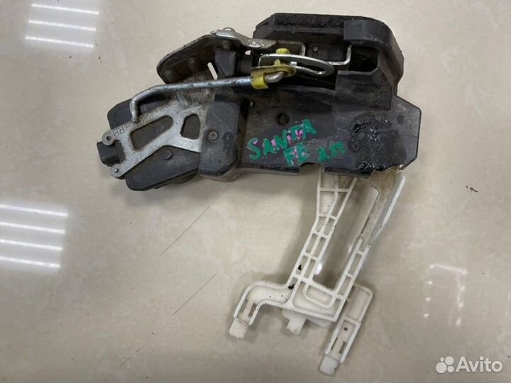 Замок боковой двери задний правый Hyundai Santa Fe