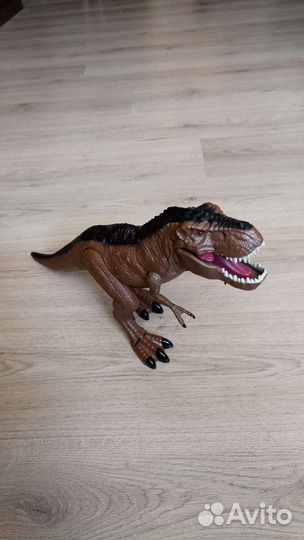 Игрушка динозавр