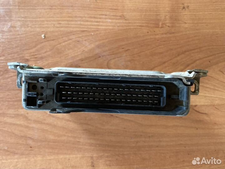 Блок управления двигателем BMW7 E32