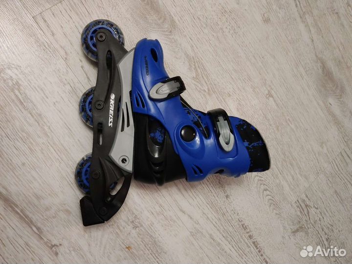 Роликовые коньки