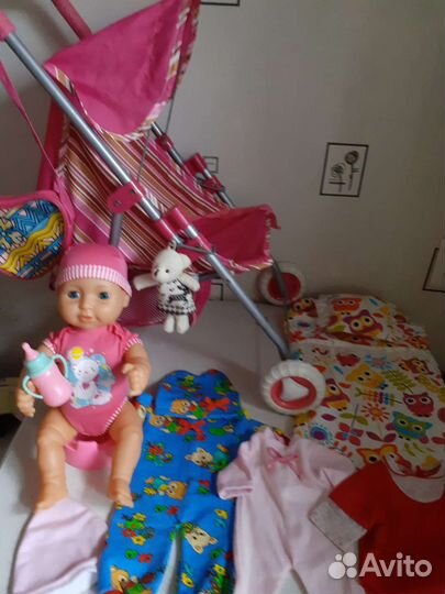 Пупс в коляске с набором для игры