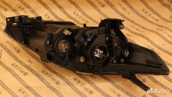 Фара левая mazda 5 V 04-07