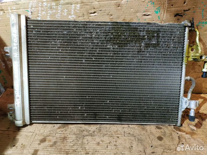 Радиатор кондиционера Opel Astra