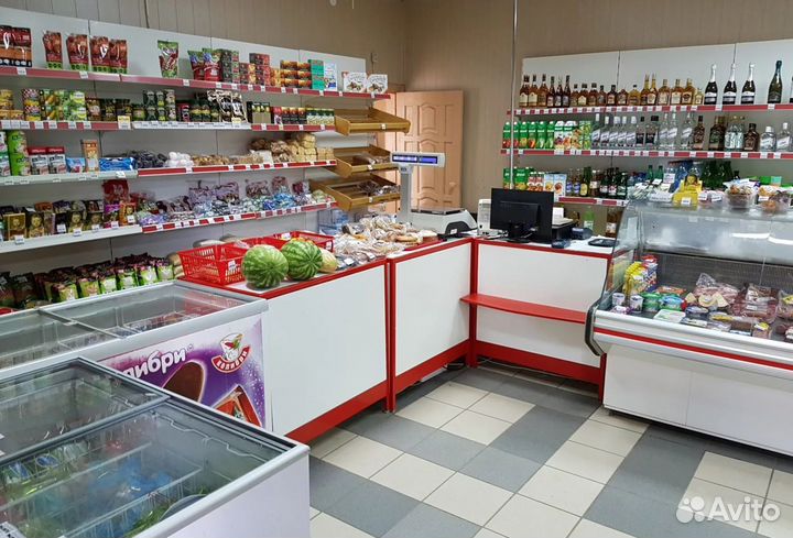 Продавец кассир в продовольственном магазине