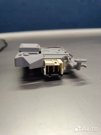 Замок люка DK042614 стир.машины TCL TWF60-F123061D