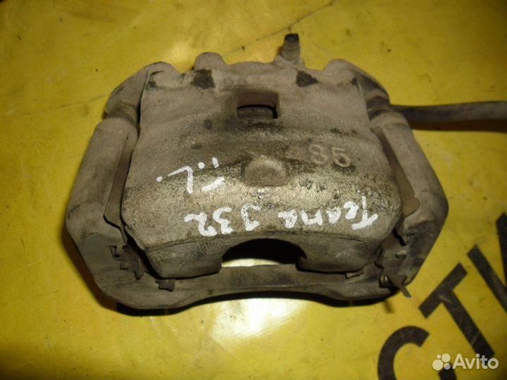 Суппорт тормозной передний левый Nissan Juke TNJ32