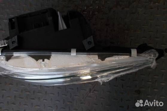 Фара левая MAN TGX TGS 4491102lmldem