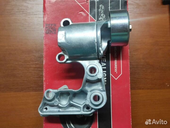 Натяжной ролик