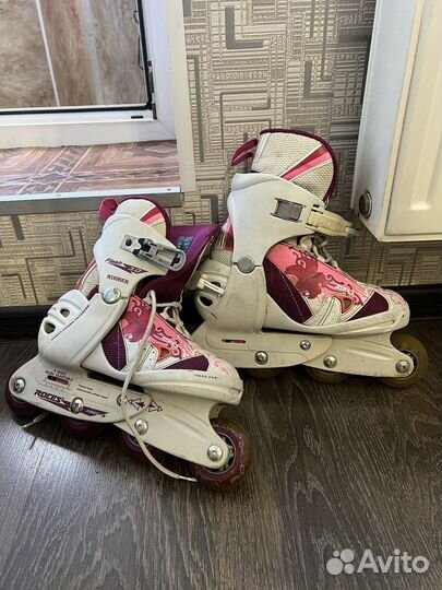 Роликовые коньки