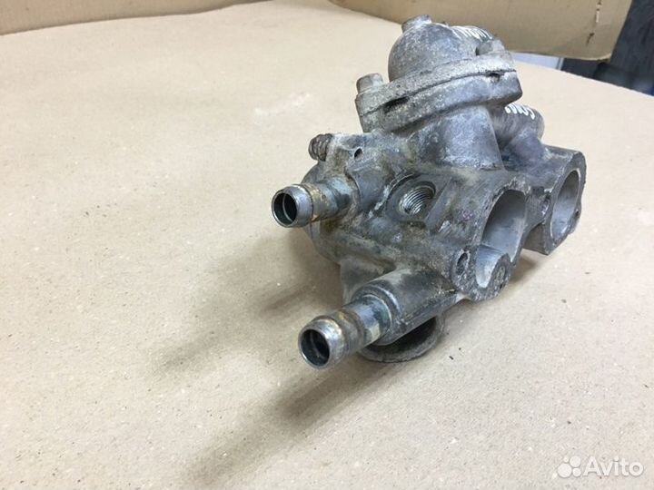 Корпус термостата Mitsubishi Lancer 10 4B11