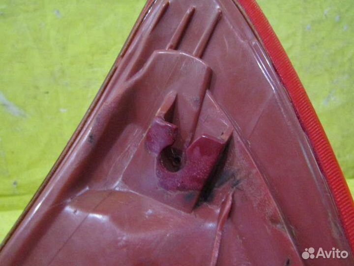 Фонарь левый Mazda Demio 11-15г 12006