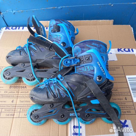 Роликовые коньки