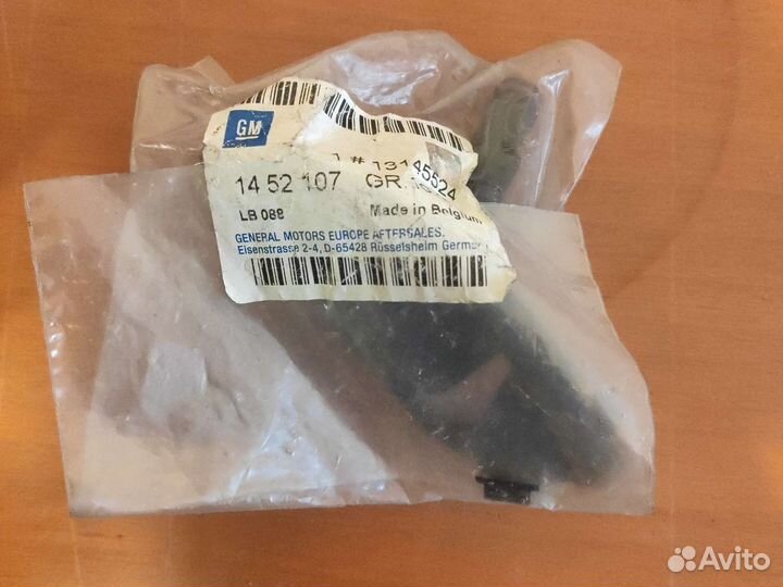 Форсунка омывателя фар левая opel