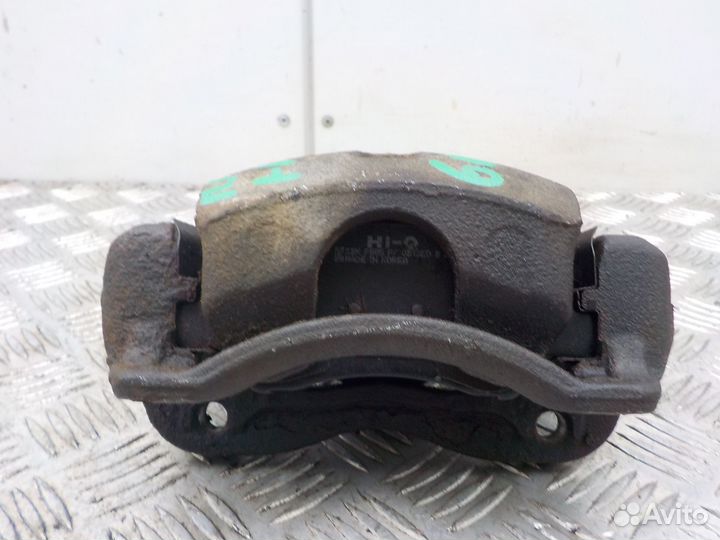 Суппорт тормозной передний левый Hyundai Solaris 2