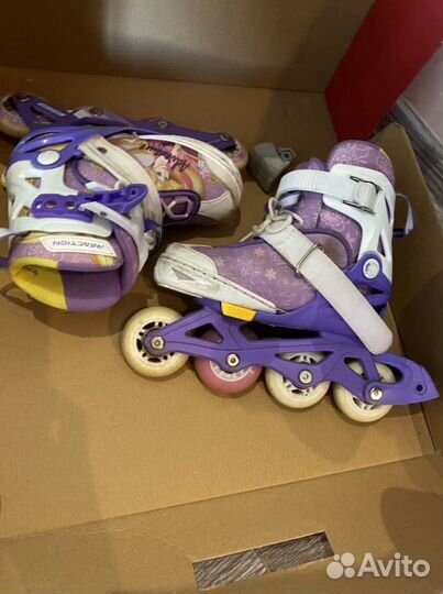 Роликовые коньки