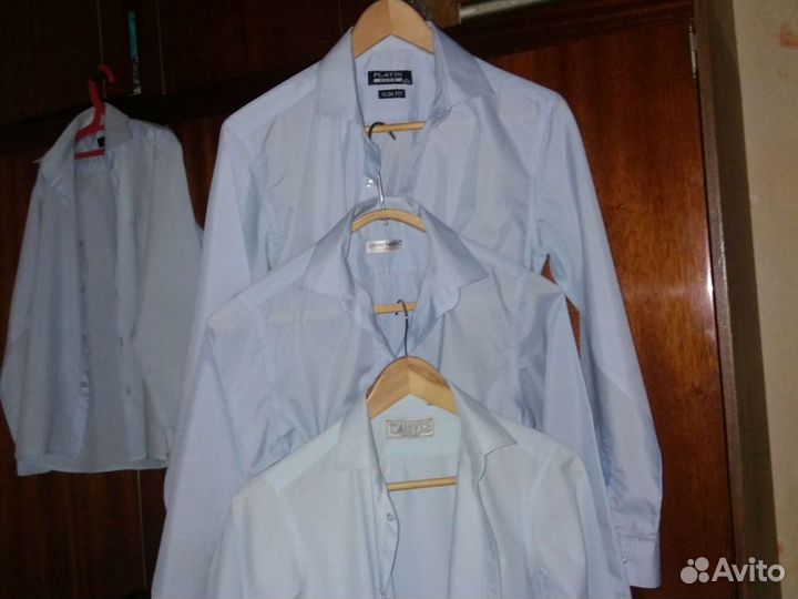 Рубашки голубые