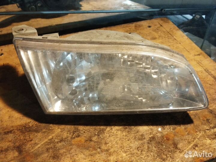 Фара левая королла 110-111