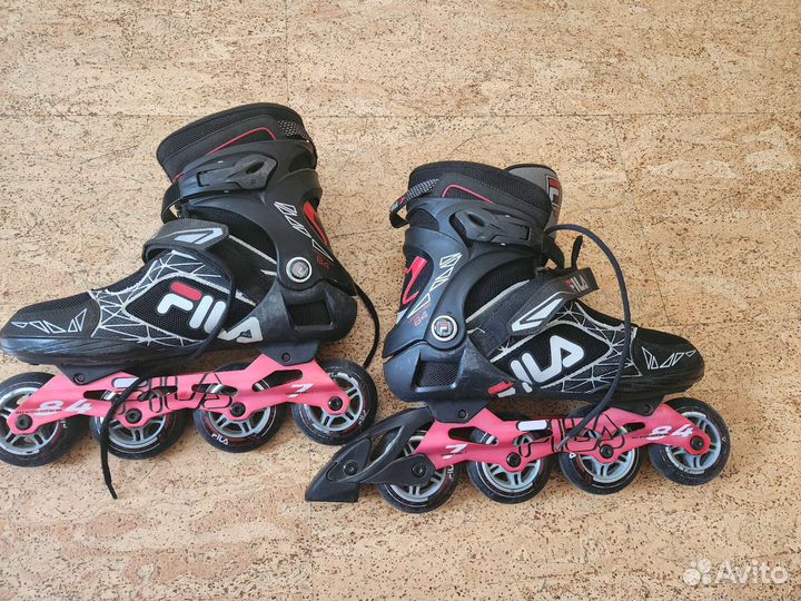 Роликовые коньки