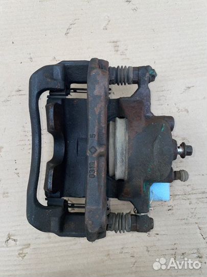 Суппорт тормозной передний левый Chevrolet Cruze