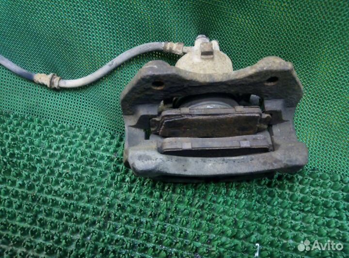 Суппорт передний левый Nissan Almera N16 N16