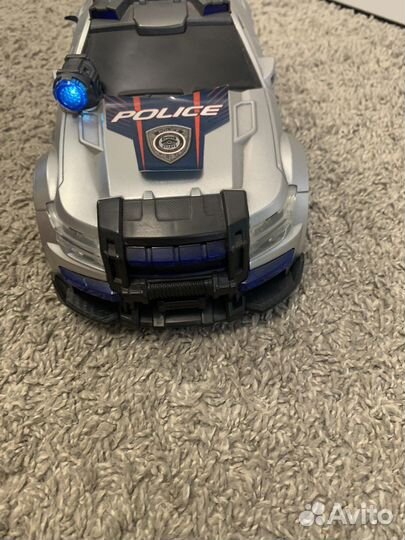 Игрушка полицейская машина