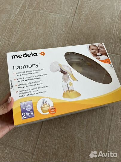 Молокоотсос medela ручной