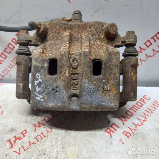 Суппорт тормозной передний правый Nissan X Trail