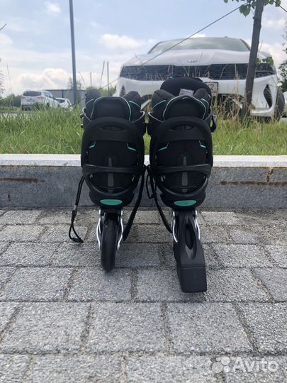 Роликовые коньки