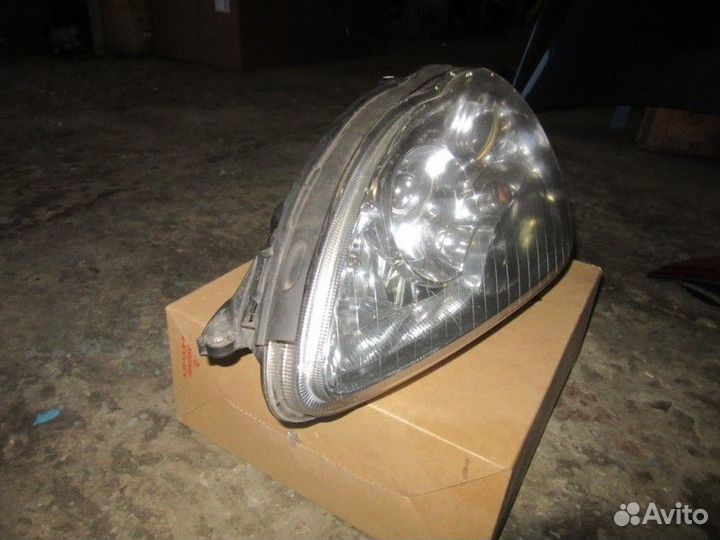 Фара левая Mercedes Benz W220