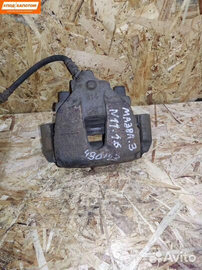 Суппорт тормозной передний правый Mazda 3 BL