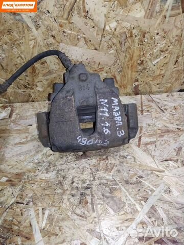 Суппорт тормозной передний правый Mazda 3 BL