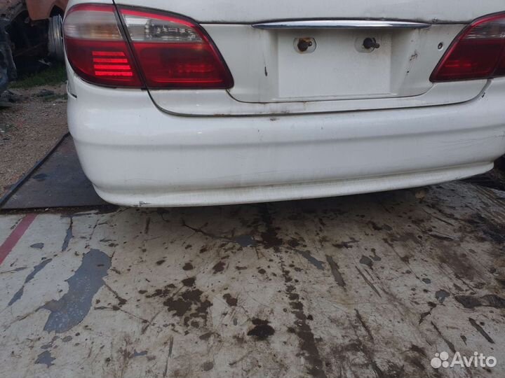 Задний бампер на ниссан цефиро 2000г