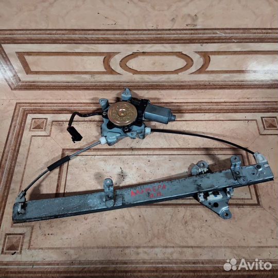 Стеклоподъемник передний Nissan Almera Classic