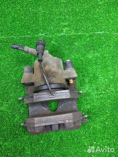 Суппорт тормозной передний левый Volkswagen Jetta