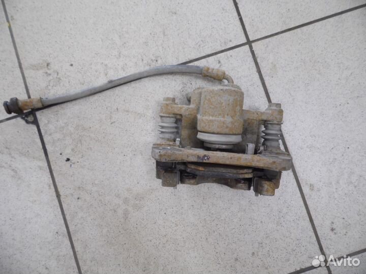 Суппорт тормозной заднийправый Chery Tiggo (T11) 2