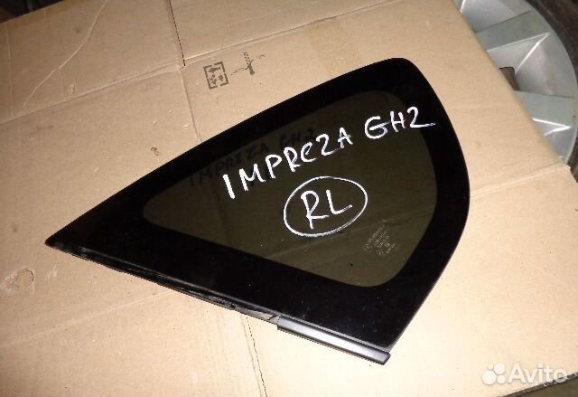 Стекло багажника Subaru Impreza G12