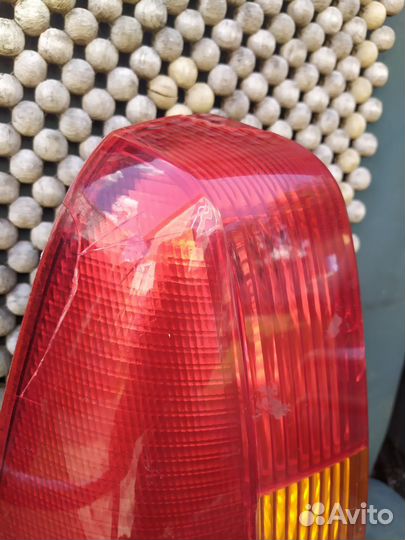 Задний левый фонарь рено логан 1