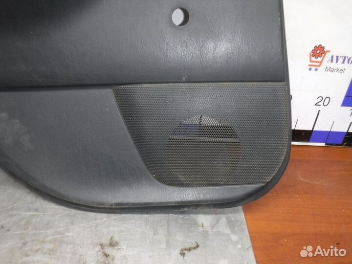 Обшивка двери задняя левая Toyota Corolla 120 4ZZ