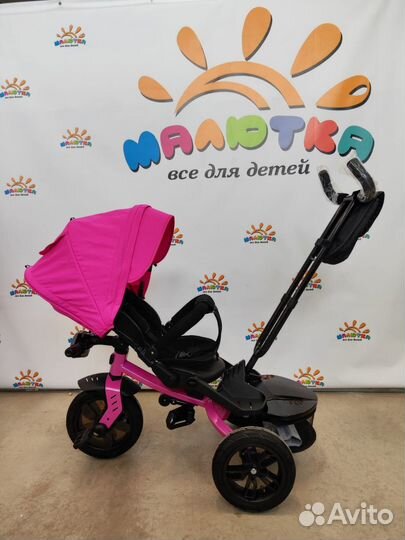 Трехколесный велосипед с поворотным сиденьем