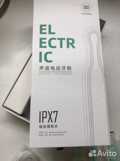 Электрическая зубная щетка