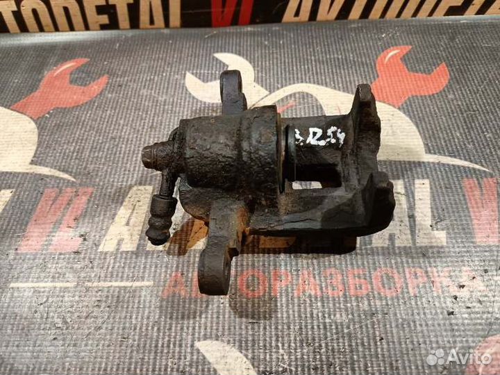 Суппорт тормозной задний правый Chevrolet Lacetti