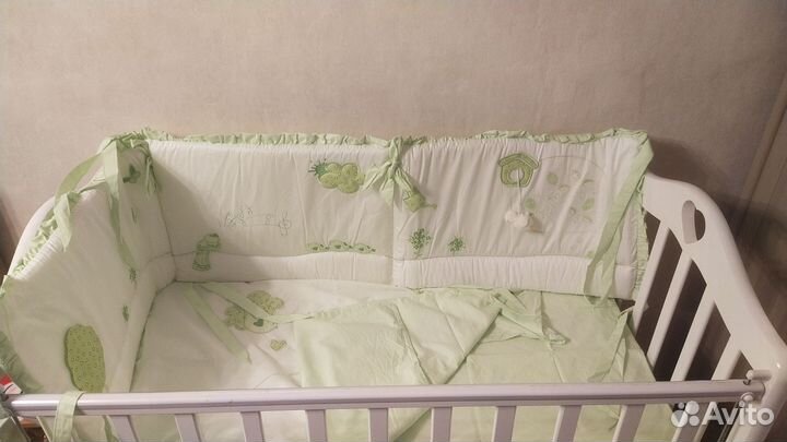 Комплект в кроватку новый