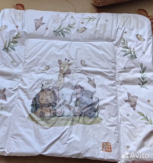 Пеленальный матрас с бортиками