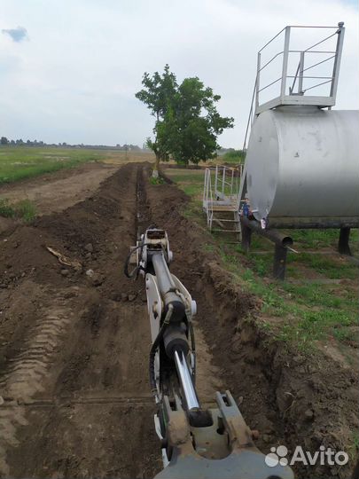 Услуги экскаватора погрузчика