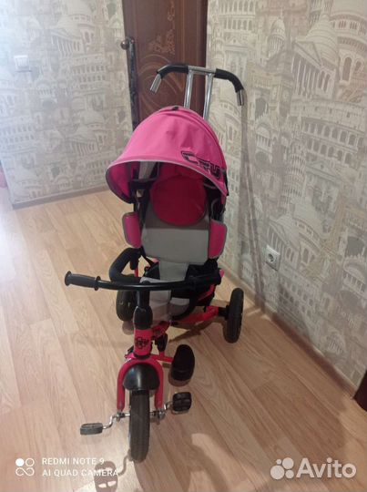 Детский трехколесный велосипед с ручкой