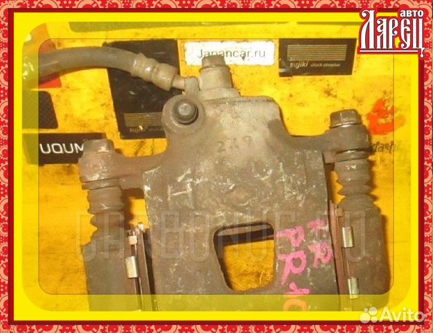 Тормозной суппорт Nissan Presea