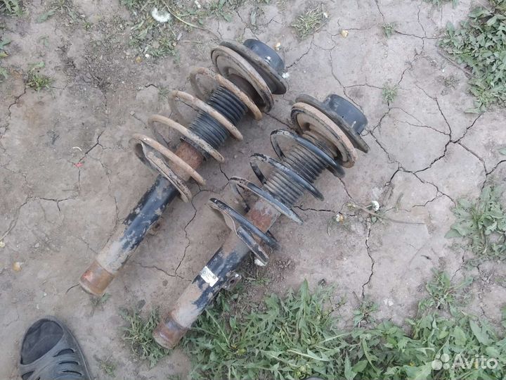 Стойки амортизатора Пежо 206