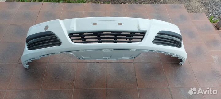 Передний бампер Opel Astra H