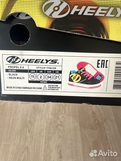 Кроссовки на роликах heelys