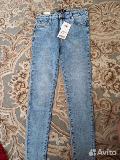 Джинсы новые